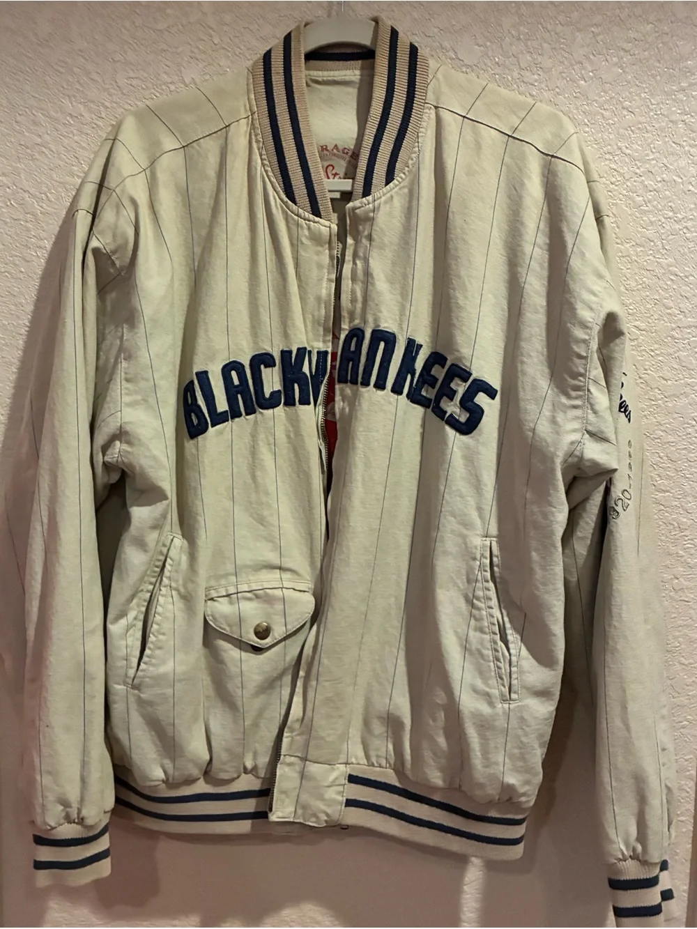 Vintage Yankees pin striped Cream Baseball Jacket with Black Lettering